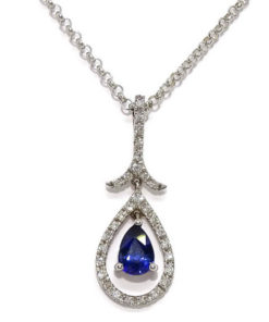 Collar de oro blanco con 0,25cts de diamantes y zafiro de 0,94cts.