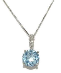 Collar de 0,07cts de diamantes y topacio azul de 3,56cts.