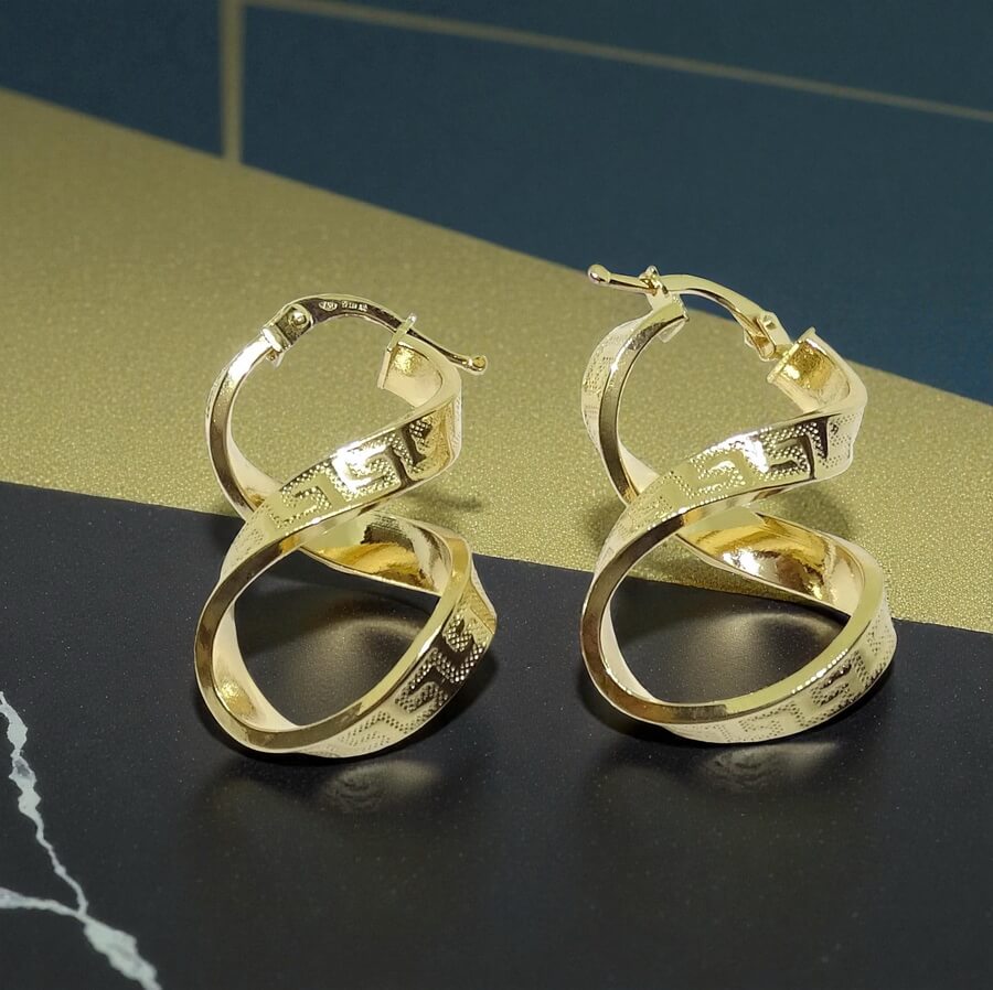 Aros ocho greca 4x29.00- 2.50gr de oro de 18k