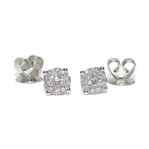 Pendientes de diamantes de 0.26cts en oro blanco de 18k con engaste invisible y cierre presión. 5mm de diámetro