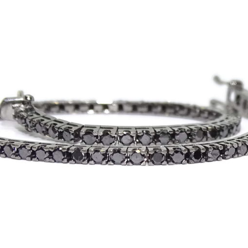 Pulsera riviere de oro blanco con diamantes negros