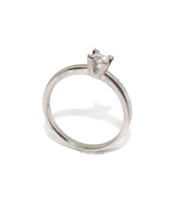 Anillo 4 garras altas 0,20cts