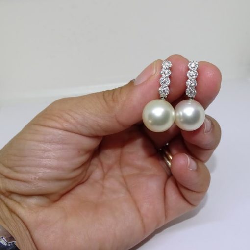 pendientes de oro blanco de 18k con 0.56cts y 2 perlas australianas de 13mm - Imagen 4