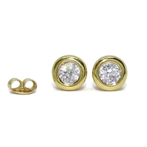 Pendientes oro amarillo de 18k tipo chatón de 8.00mm con 2 circonitas y cierre presión.