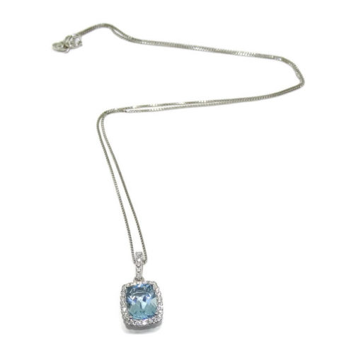 Colgante con diamantes en oro blanco de 18k con 1 topacio azul de 8×9 con cadena veneciana de 40cm todo oro de 18k. - Imagen 6