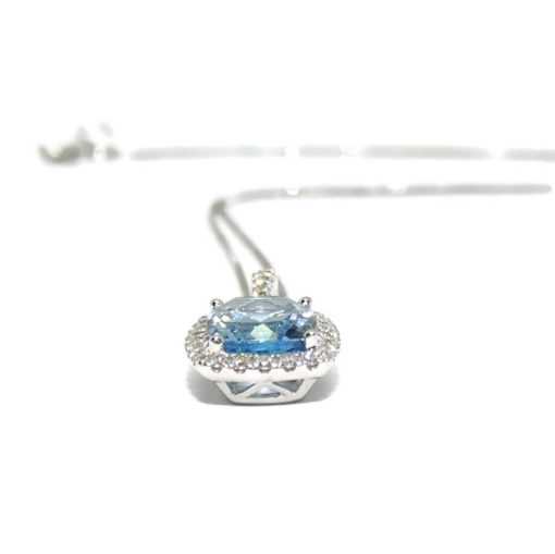 Colgante con diamantes en oro blanco de 18k con 1 topacio azul de 8×9 con cadena veneciana de 40cm todo oro de 18k. - Imagen 5