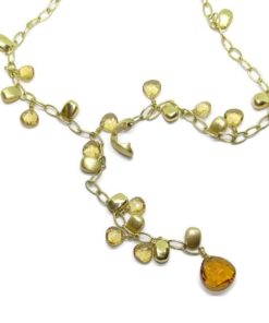Collar de oro blanco de 18k con 14 pepitas de oro y citrinos .