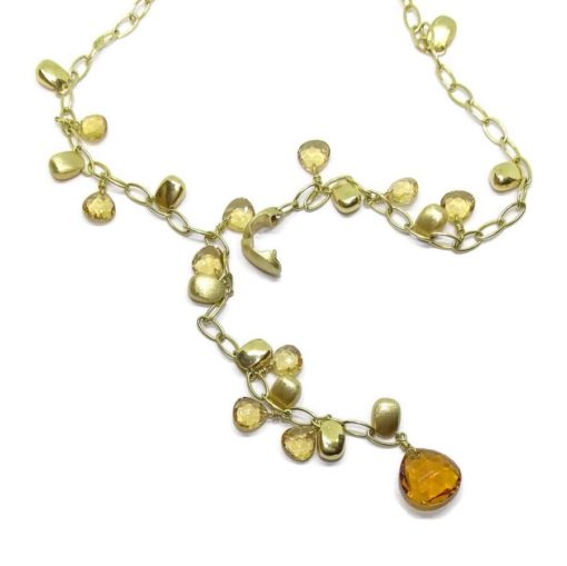 Collar de oro blanco de 18k con 14 pepitas de oro y citrinos .