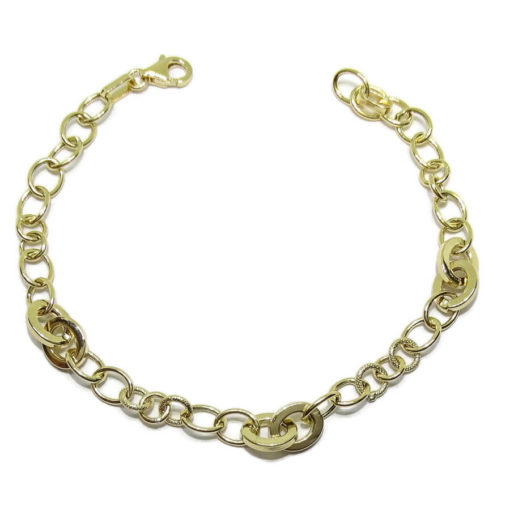 Pulsera de oro amarillo de 18k con anillas mate y brillo. 19.00cm de larga.