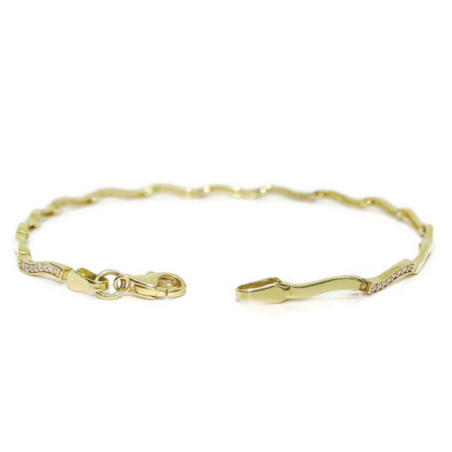 Pulsera de oro amarillo de 18 quilates para mujer con circonitas. Clásica y elegante. - Imagen 5