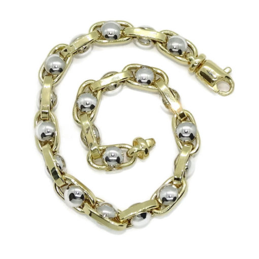 Pulsera para hombre de oro de 18k bicolor, con cadena forzada en oro amarillo y círculos de oro blanco de 18k, 7mm de ancha, largo 21.50cm. - Imagen 3