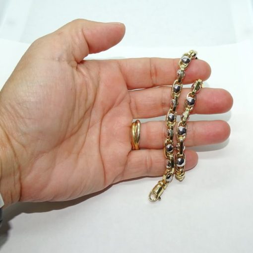 Pulsera para hombre de oro de 18k bicolor, con cadena forzada en oro amarillo y círculos de oro blanco de 18k, 7mm de ancha, largo 21.50cm. - Imagen 5