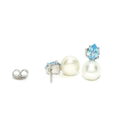 Pendientes con 2 topacios azules engastados con 4 garras en oro blanco de 18k y 2 perlas cultivadas de 7mm. - Imagen 6