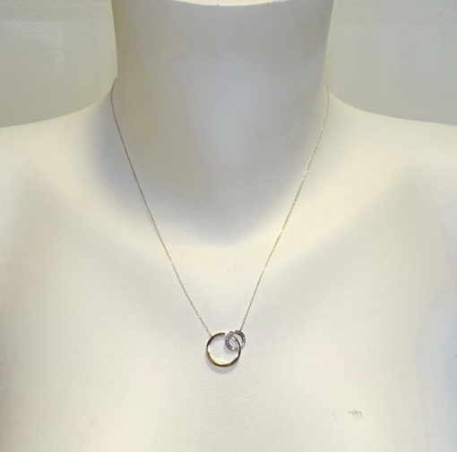 Collar de oro de 18k con 2 círculos, en oro blanco con circonitas y oro amarillo de 18k. - Imagen 2