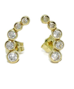 Pendiente trepador de oro amarillo de 18k con circonitas. Cierre presión