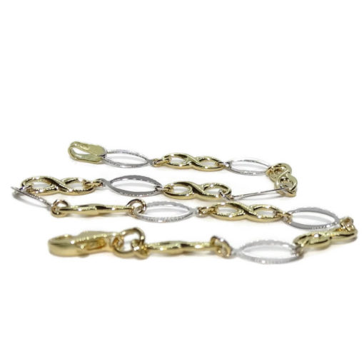 Pulsera de oro amarillo y oro blanco para mujer con infinitos y eslabones ovalados. 19.00cm de larga. - Imagen 3