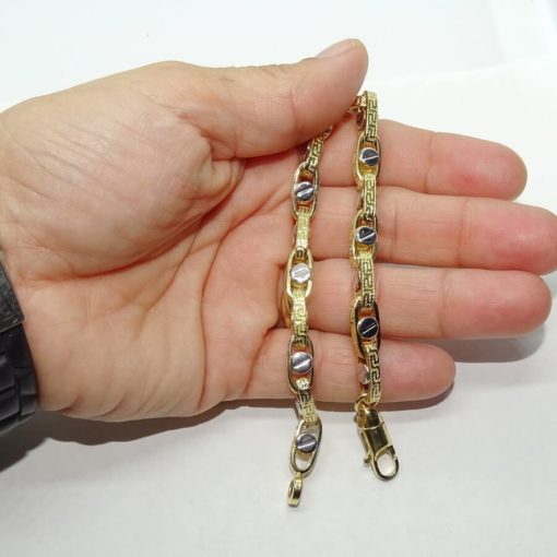 Pulsera para hombre de oro amarillo y oro blanco de 18k con cadena forzada con greca y detalle de tornillo. 12.20gr - Imagen 4