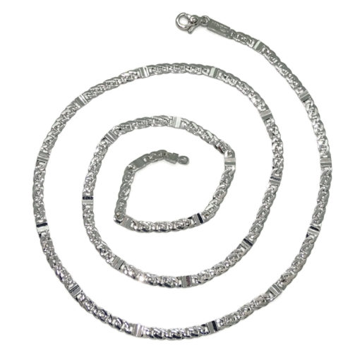Cadena de oro macizo blanco de 18k para hombre modelo barbada y eslabón plano de 4.00mm de ancha y 60cm de larga. 12.55gr.