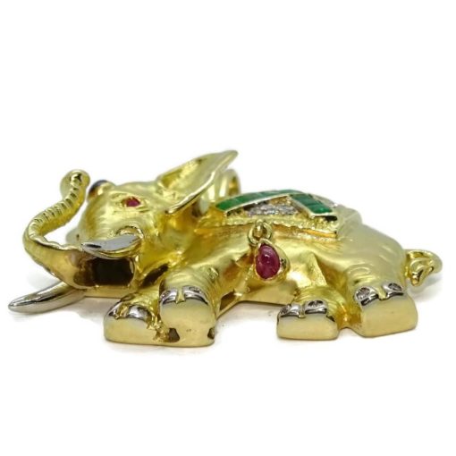 Elefante de oro amarillo de 18k con diamantes y piedras preciosas. - Imagen 7
