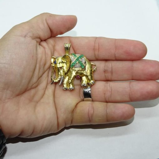 Elefante de oro amarillo de 18k con diamantes y piedras preciosas. - Imagen 2