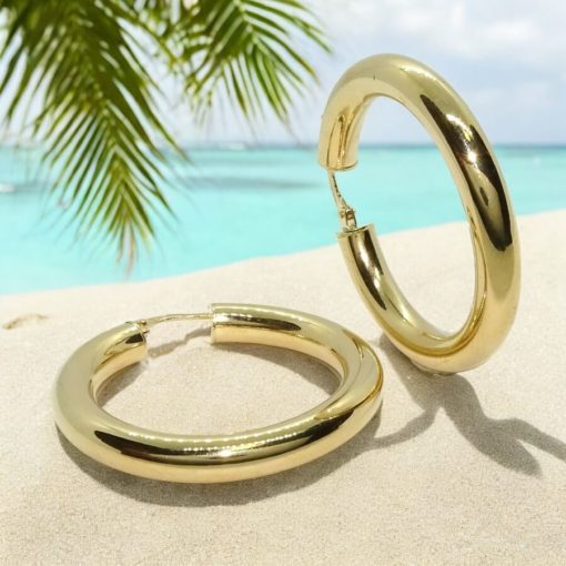 Pendientes aros de oro amarillo de 18k anchos, de 5mm de grosor y 3.80cm de diámetro exterior. 7.60gr de oro de 18k Cierre fácil click