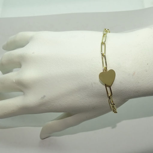 Pulsera de oro amarillo de 18k con eslabones forzados y corazón central. 18.50 cm - Imagen 2