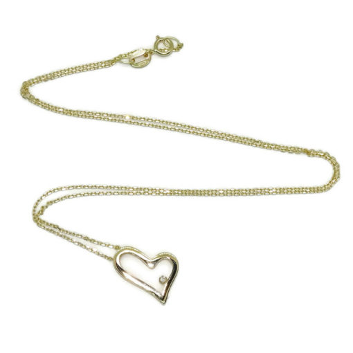 Precioso collar de oro amarillo de 18 k con un diamante talla brillante de 0.015cts engastado en un precioso corazón de oro amarillo de 18k - Imagen 7