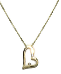 Precioso collar de oro amarillo de 18 k con un diamante talla brillante de 0.015cts engastado en un precioso corazón de oro amarillo de 18k