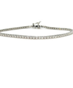 Pulsera tipo riviere con diamantes talla brillante y oro blanco de 18k. Eslabones de 2.00 mm de anchos por 2.00 mm de gruesos De 17.50cm de larga