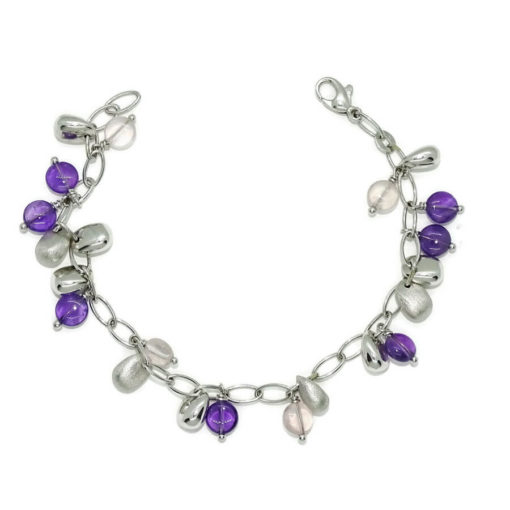 Pulsera de oro blanco de 18k con 11 amatistas , 4 ópalos rosas y 11 pepitas de oro.