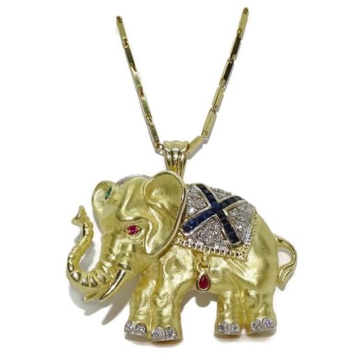 Impresionante elefante de oro amarillo de 18k con cadena de oro macizo de 50.00cm. Total: 37.20 gr de oro de 18k.