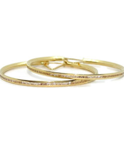 Pendientes aros de oro amarillo de 18k con circonitas en carril.