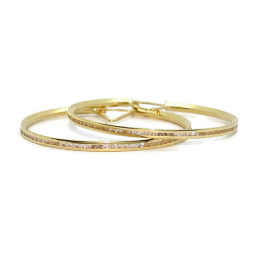 Pendientes aros de oro amarillo de 18k con circonitas en carril.