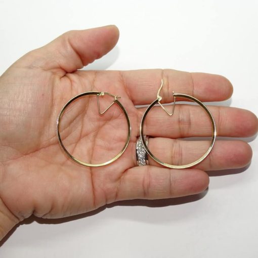 Pendientes aros de oro amarillo de 18k con circonitas en carril. - Imagen 4