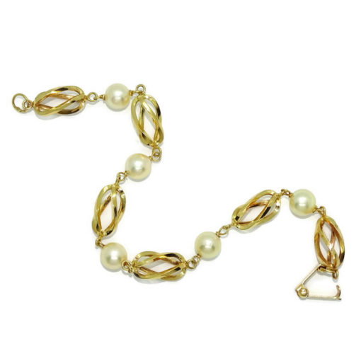 Preciosa, elegante y clásica pulsera de oro amarillo de 18K con 5 perlas cultivadas de 7.00 mm y pulsera tipo reja/jaula unida a mano. - Imagen 5