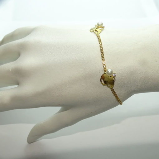 Preciosa pulsera especial para comunión toda de oro amarillo de 18k, con motivos. - Imagen 2