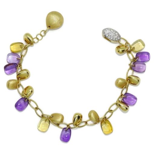 Preciosa pulsera de oro amarillo de 18k con 4 citrinos, 7 amatistas y 11 pepitas de oro.