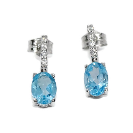Preciosos pendientes largos de oro blanco de 18K con 8 circonitas blancas y 2 topacios azules. - Imagen 8