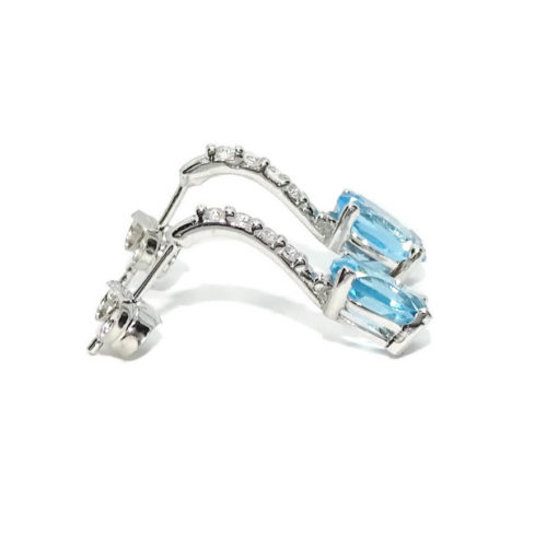 Preciosos pendientes largos de oro blanco de 18K con 8 circonitas blancas y 2 topacios azules. - Imagen 6