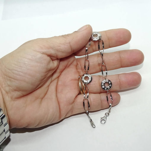 Pulsera de oro blanco de 18k para mujer con circulos con circonitas y cadena ondulada. - Imagen 3