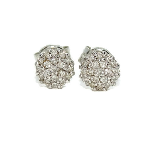 Preciosos y vistosos pendientes de 0.36cts de diamantes talla brillante montados en oro blanco de 18k con cierre presión y 7mm de diámetro.