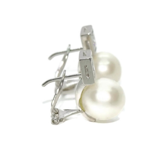 Pendientes tu y yo para mujer de oro blanco de 18k con 0.22cts de diamantes y perla cultivada. - Imagen 7