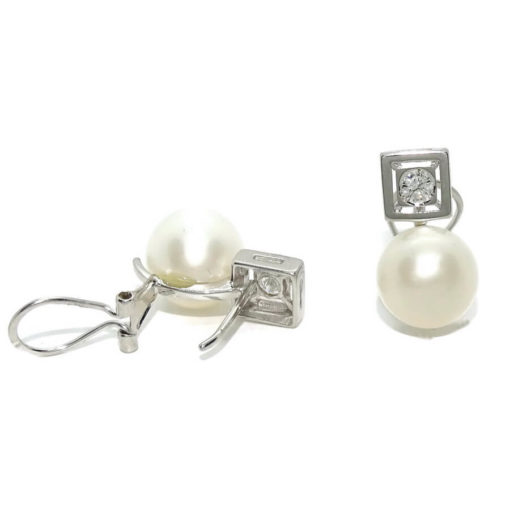Pendientes tu y yo para mujer de oro blanco de 18k con 0.22cts de diamantes y perla cultivada. - Imagen 6