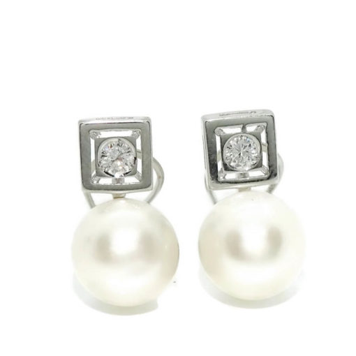 Pendientes tu y yo para mujer de oro blanco de 18k con 0.22cts de diamantes y perla cultivada. - Imagen 8