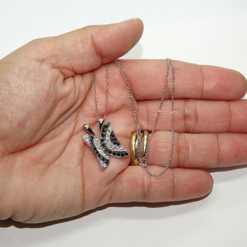 Colgante mariposa con circonitas blancas y negras de oro blanco de 18k con cadena rolo de 45cm todo oro de 18k - Imagen 3