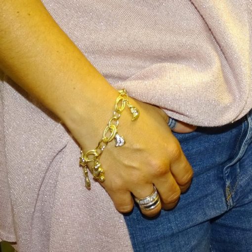 Preciosa y alegre pulsera para mujer de oro amarillo y oro blanco lapidado de 18k con 5 motivos. - Imagen 2