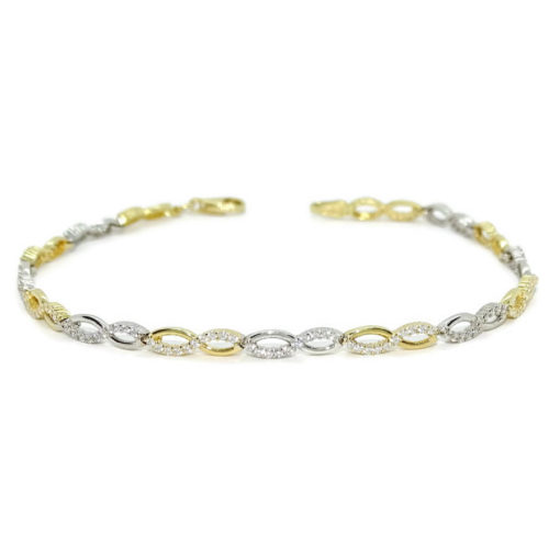 Pulsera semi-rígida de oro amarillo y oro blanco de 18k con infinitos y circonitas.