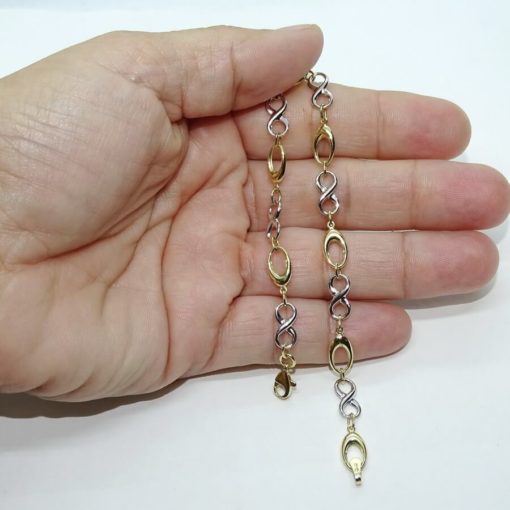 Pulsera de oro amarillo y oro blanco para mujer con infinitos y eslabones ovalados. Todo oro 18k - Imagen 3