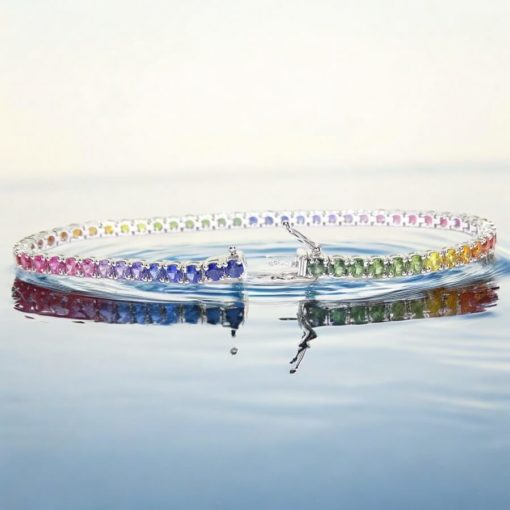 pulsera tipo riviere para mujer de oro blanco de 18k y 6.33cts de zafiros de color. Tendencia rainbow, 8.65gr de oro 18k