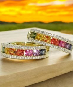 Impresionantes pendientes para mujer con 88 diamantes auténticos y 14 zafiros de color certificados montados en oro amarillo de 18k.